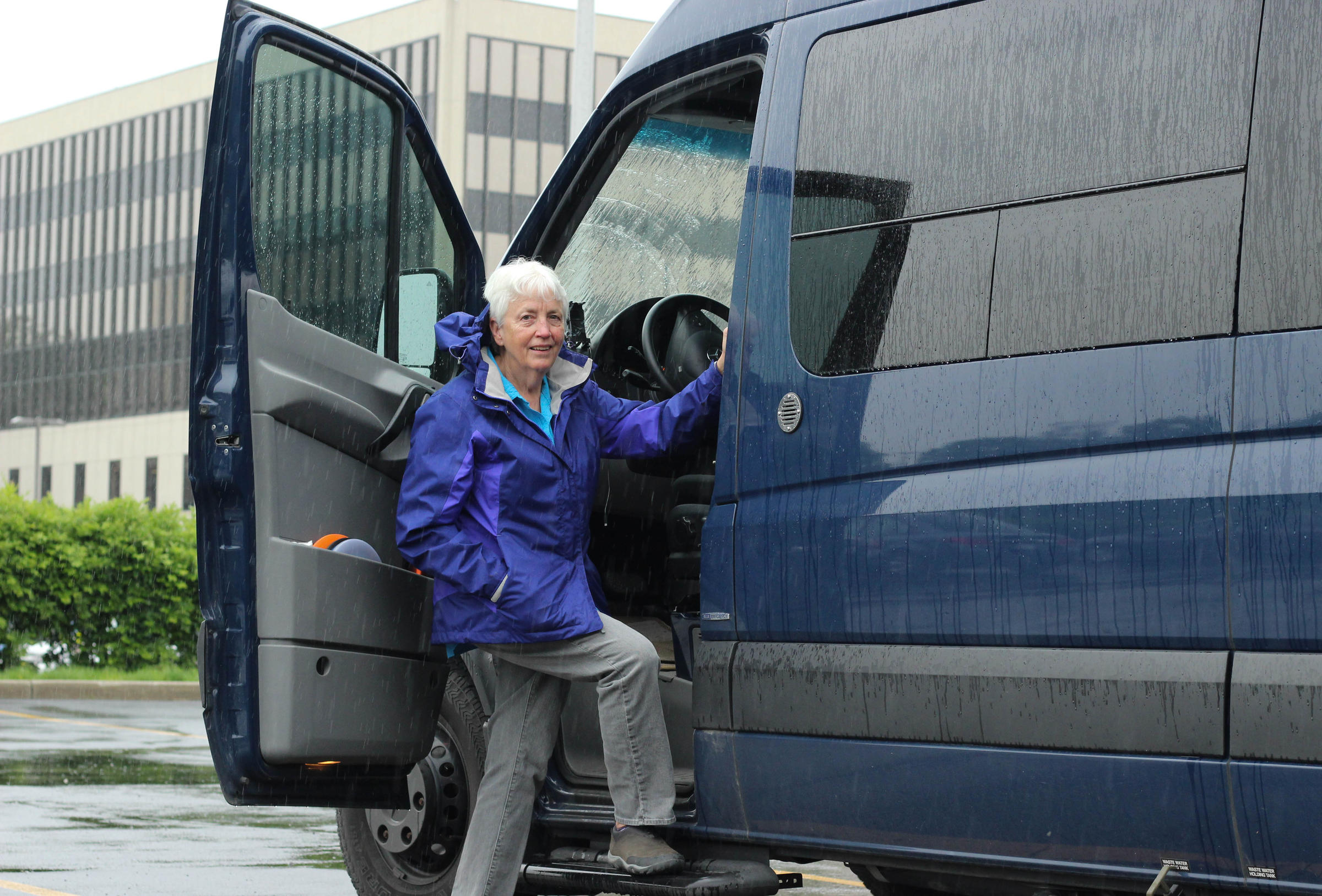 Diane in front of her van at Ohio State